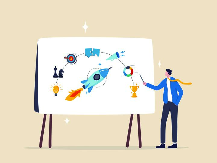 An illustration of a man pointing at a whiteboard with a rocket surrounded by icons like a trophy, pie chart, and chessboard knight.