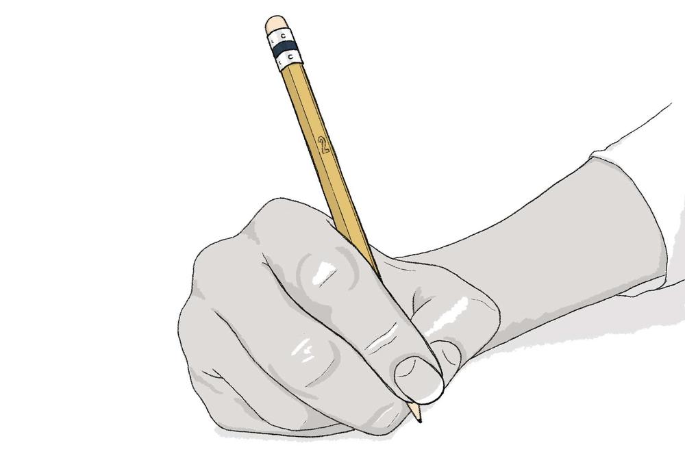 A hand holding a pencil