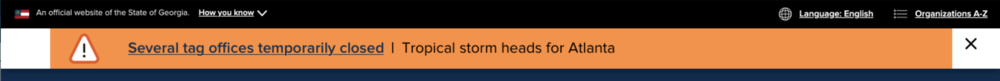 A thin, wide rectangle filled in with orange and a triangular alert symbol on the left with an exclamation mark inside the triangle.